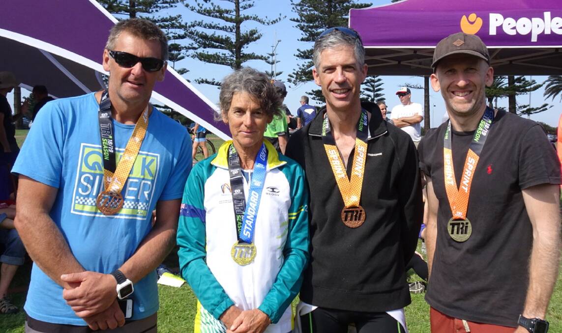 Eurocoast Triathlon Club members Adrian Connor, Sally Jeffrey, Lachlan Brown and Dan Lloyd-Jones after racing in the Peoplecare Triathlon Festival held at Wollongong earlier this month.