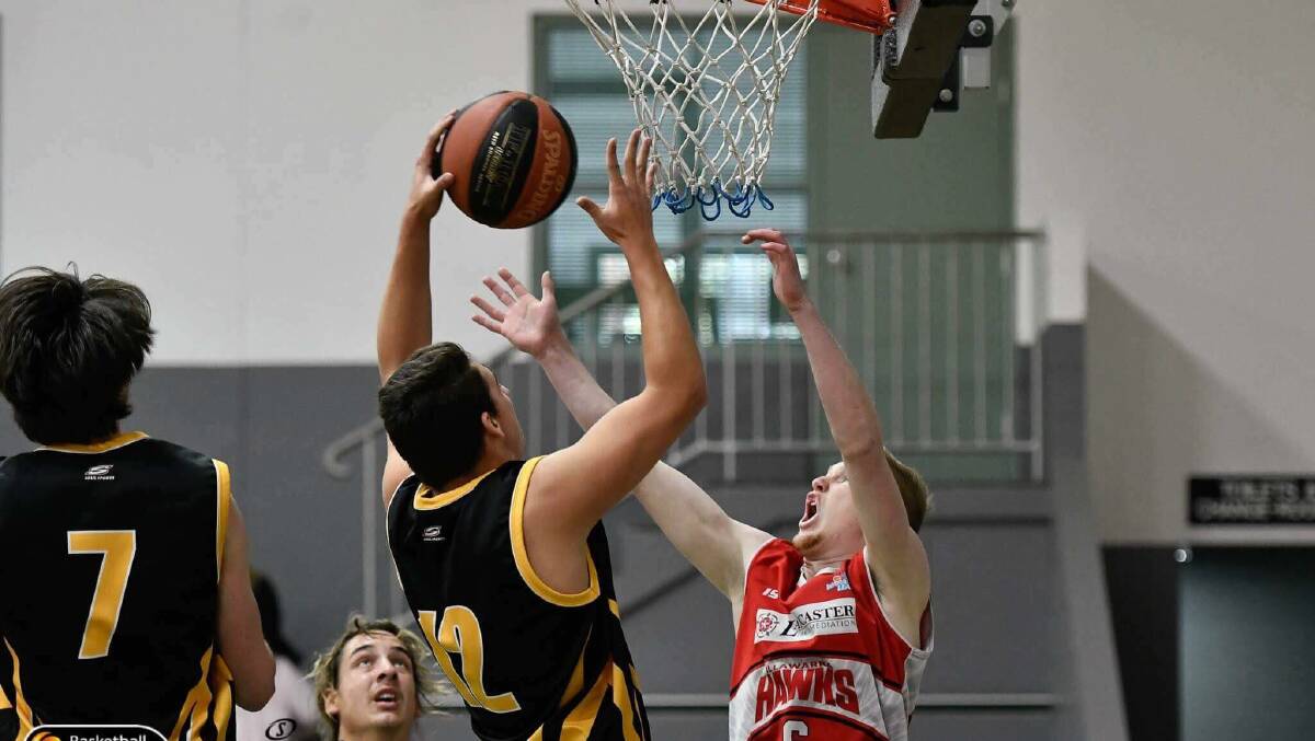 Jeremy Harding goes up for a lay up during the Shoalhaven Tigers' win over the Illawarra Hawks. Photo: NSW Basketball Media.