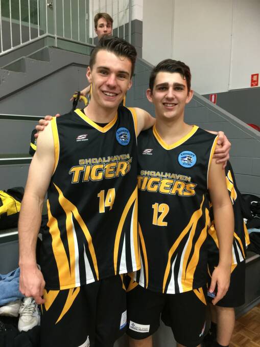 CHAMPIONS: Riley O'Shannessy and Jeremy Harding after their Waratah League youth men division two championship win over the Illawarra Hawks.