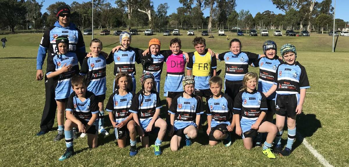 MIGHTY MINI SHARKS: The Moruya-Tuross Sharks under 10s. The team demonstrated  impressive ball skills against the Bega Roosters.