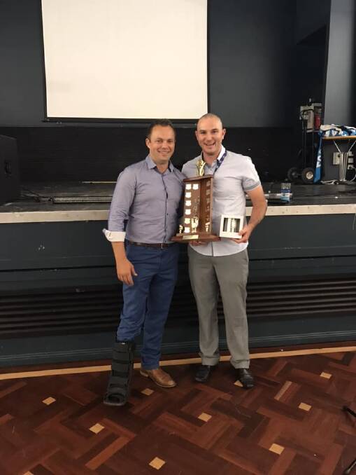 SKIP: Michael Kenny (right) receives the Seahawk of the Year award from club president Arlo Ireland. Photo: Batemans Bay Seahawks/Waves.
