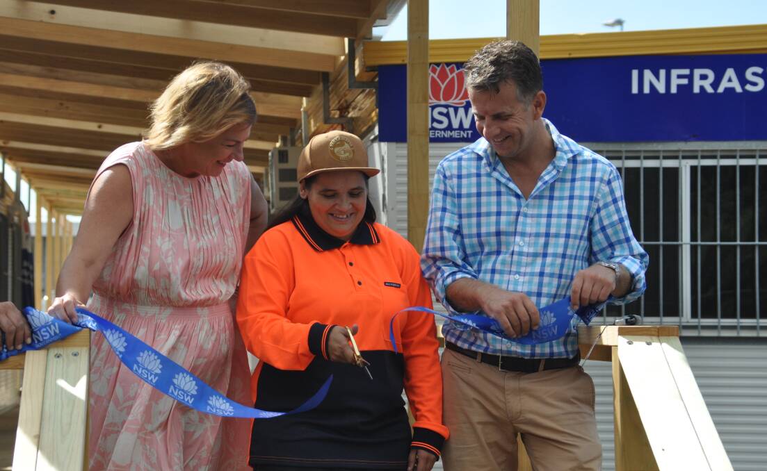 Trainee Sameeka Wighton cuts the ribbon for the new  Infrastructure Skills Legacy Training Hub as Roads Minister Melinda Pavey and Bega MP Andrew Constance look on.