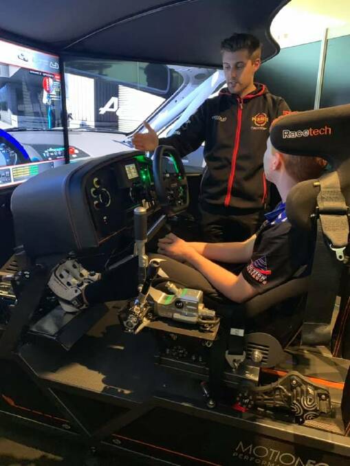Bailey Sweeny is trained by Supercars driver, Anton de Pasquale, in the Erebus simulator in Melbourne.