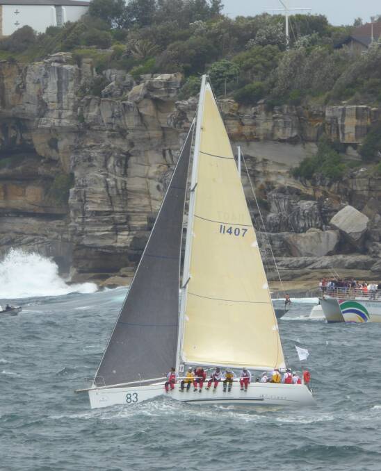 Pelagic Magic leaves Sydney Heads during the Sydney to Hobart Yacht Race.