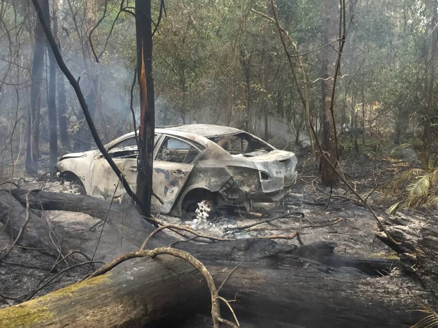 Police said a car was completely destroyed by the fire and police were investigating several lines of inquiry. Picture: Batemans Bay Fire and Rescue.