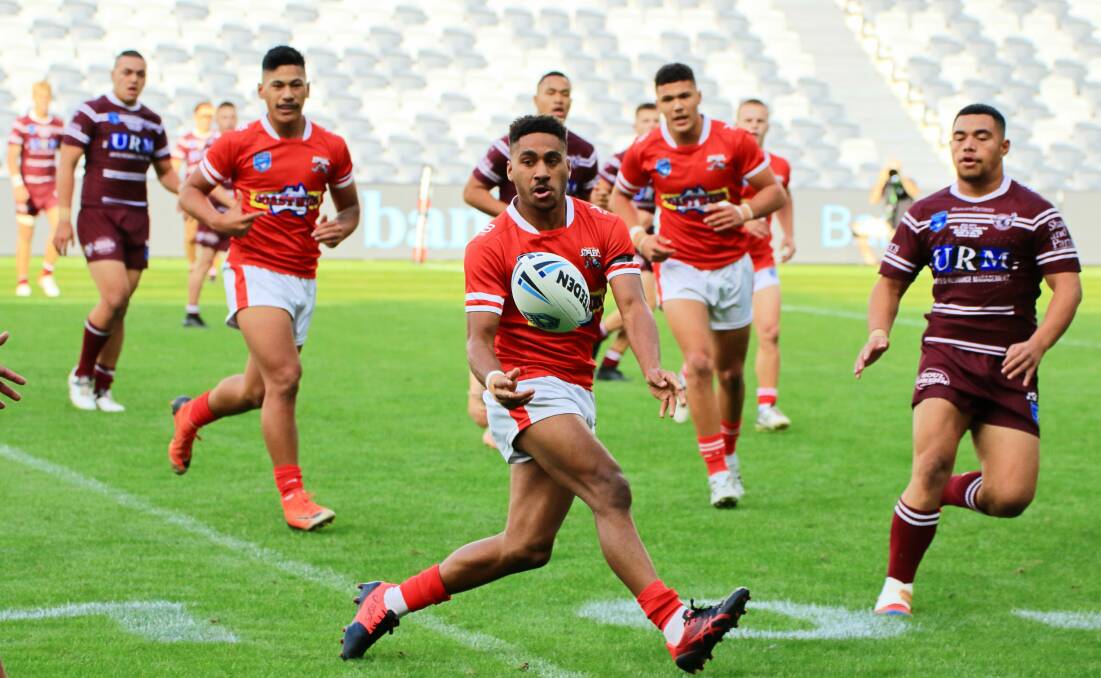Treigh Stewart throws a pass during the Illawarra Steelers' grand-final win over the Manly Warringah Sea Eagles.