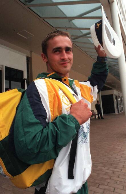 PROUD: Kravtsov returns to Canberra Airport after his triumphant display at the 1998 Commonwealth Games.