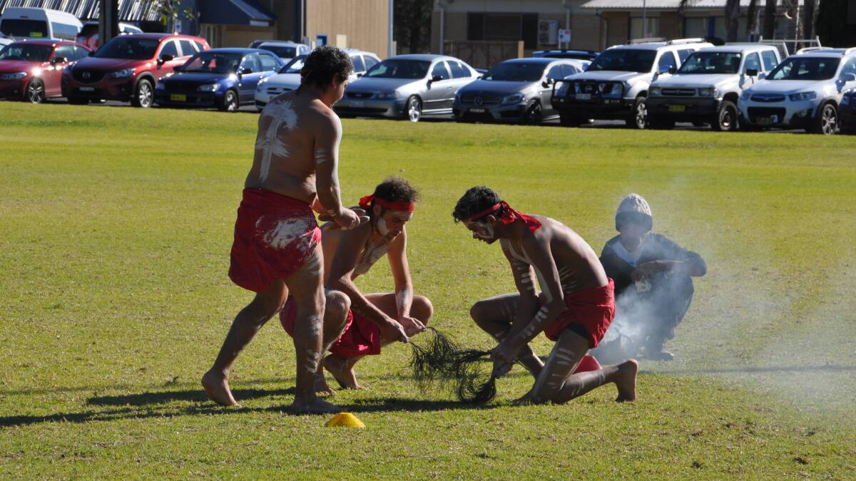MEANINGFUL: Max Harrison (left), a Batemans Bay Boars player, led traditional dancing during Indigenous Round at Hanging Rock Oval.