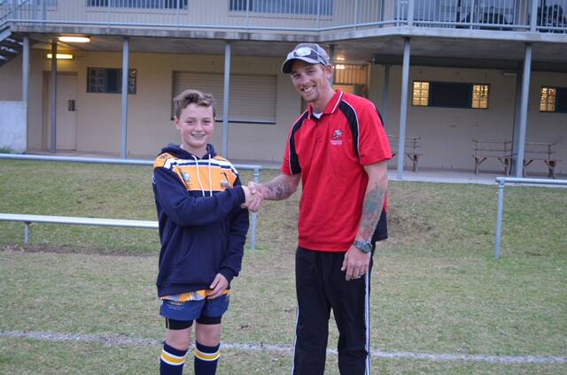 Luke Gallen with Junior Boars vice president Brendon Campbell.