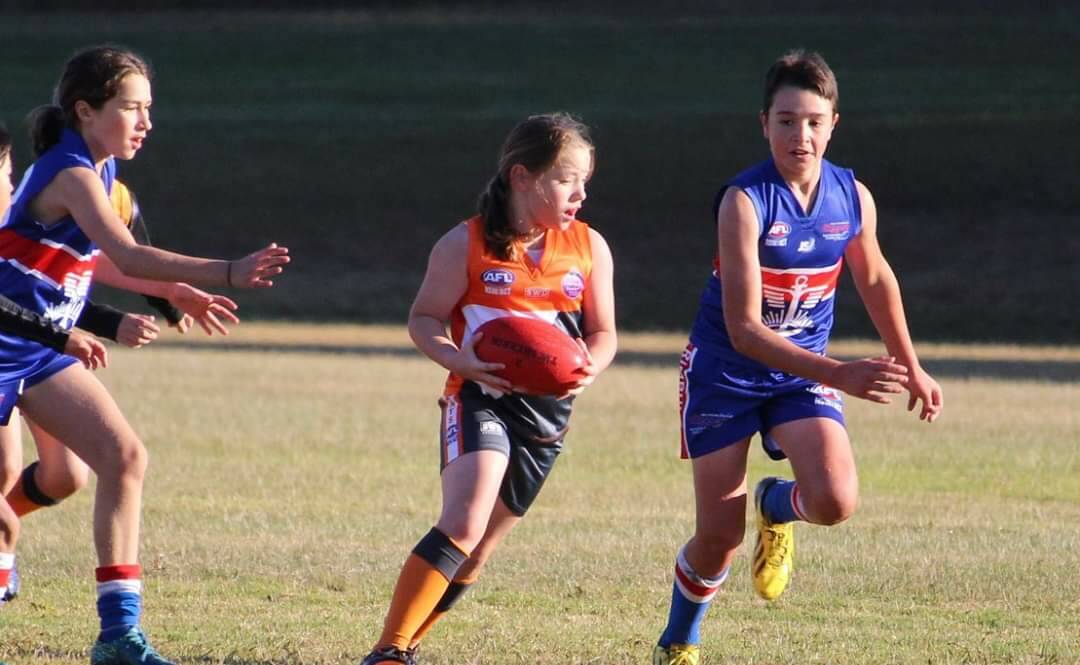 Aussie Rules is a great sport for both boys and girls.