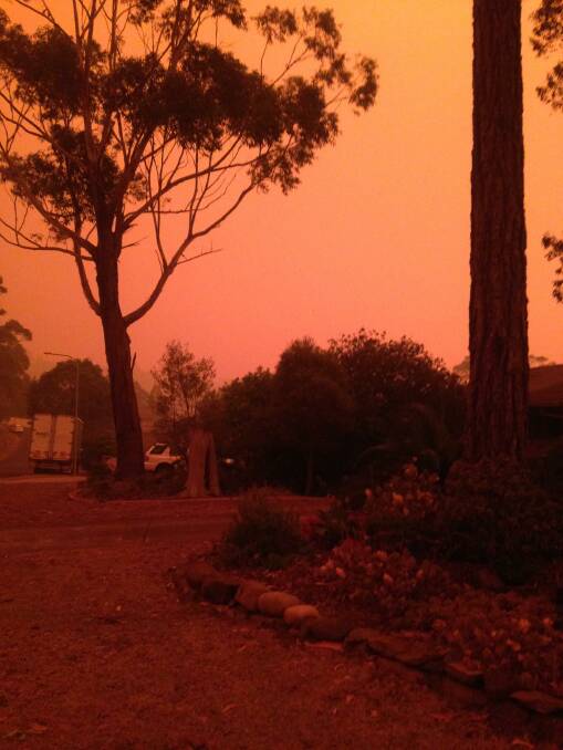 EERIE: The sky turns orange again at 4.38pm on New Year's Day as fires burn in other parts of Batemans Bay. PHOTO: Sharon Halliday
