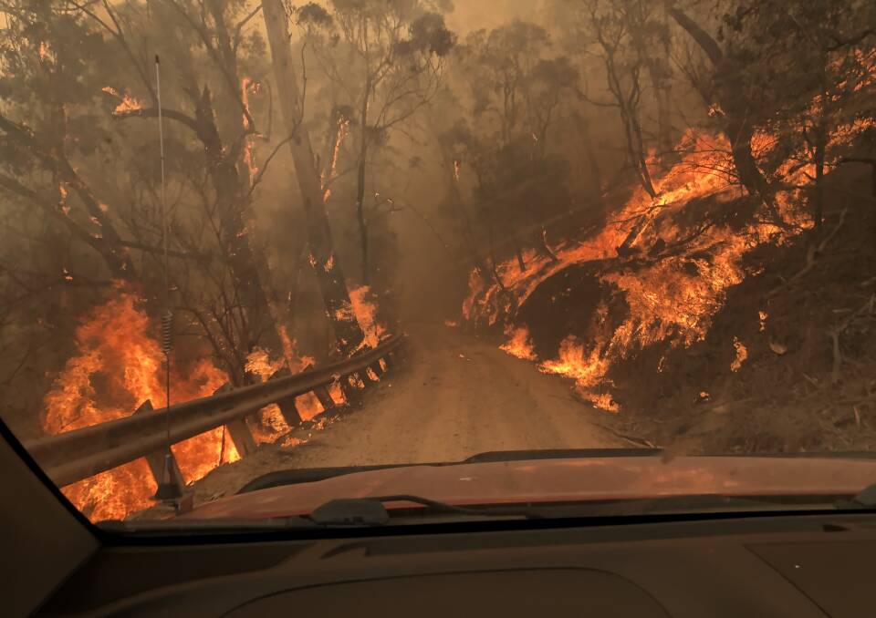 CLOSED: Roads are closed around Jenolan Caves. Click on the photo for story about firefighters' battle to save this area. Photo: FRNSW