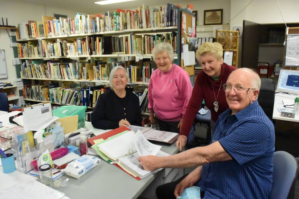 Members of the Milton Ulladulla Family History research team Margaret Magnusson [librarian], Christine Moss [assistant librarian], Cheryl Baker [welfare] and Ron Smith [vice president] work on another interesting retail based story.