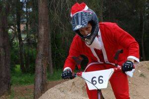 SUPER SANTA:  “Rad Santa” (aka Brett Colman) shows off his riding skills at the Batemans Bay BMX Club’s Christmas meet.