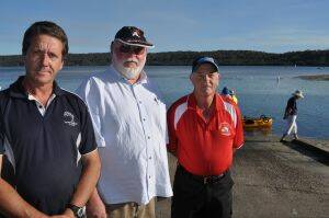 DREDGE IT:  Campaigning for Eurobodalla Shire Council to dredge sand from the Tuross boat ramp are the Tuross Boatshed and Café’s John Suthern, Tuross Head Progress Association’s Jeff de Jager and Tuross Fishing Club president Eric Saberton.