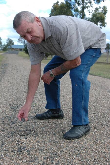 TAKEN IN: Moruya resident Ken Weston is a victim of the “Bitumen Bandits” who have been travelling across NSW doing bogus bitumen jobs.