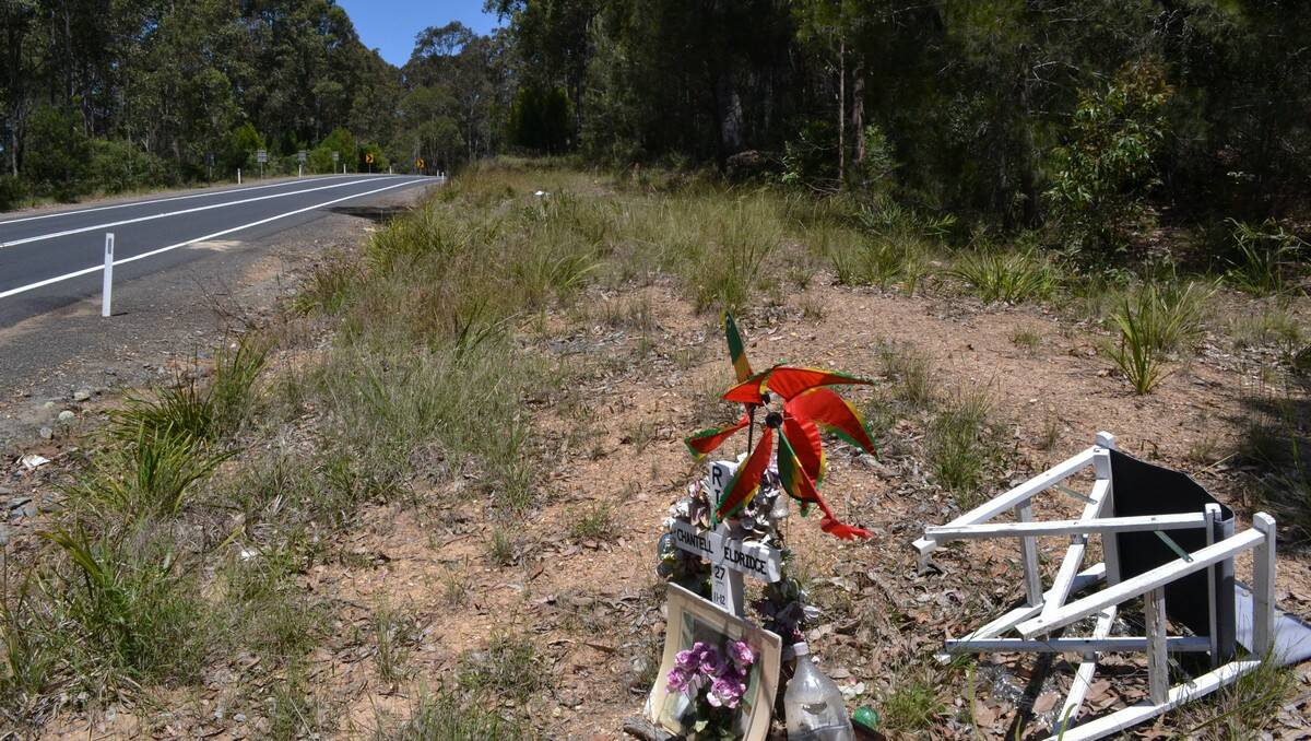 METRES AWAY: The motorcyclist came to rest mere metres away from the roadside memorial to Narooma woman Chantell Eldridge, who was killed on the same corner of the Princes Highway.