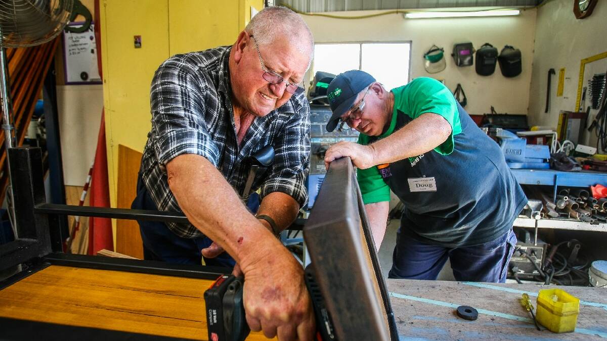 KIAMA: Albion Park Mens Shed members Tim Brown and Doug Faucett working away. The Shed opened its doors to attract new members   Picture DYLAN ROBINSON  